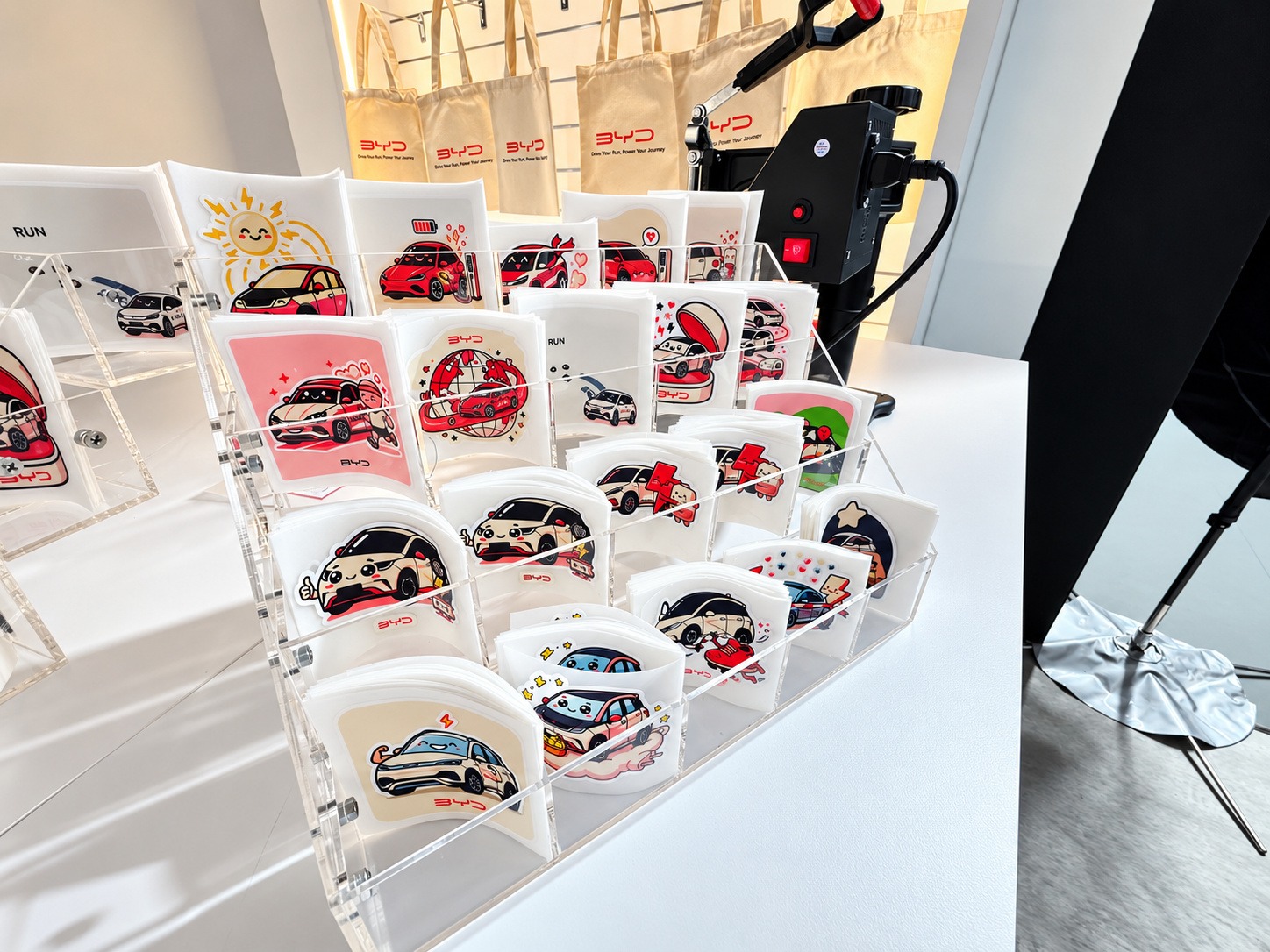 Colourful car transfer designs displayed for guests to choose